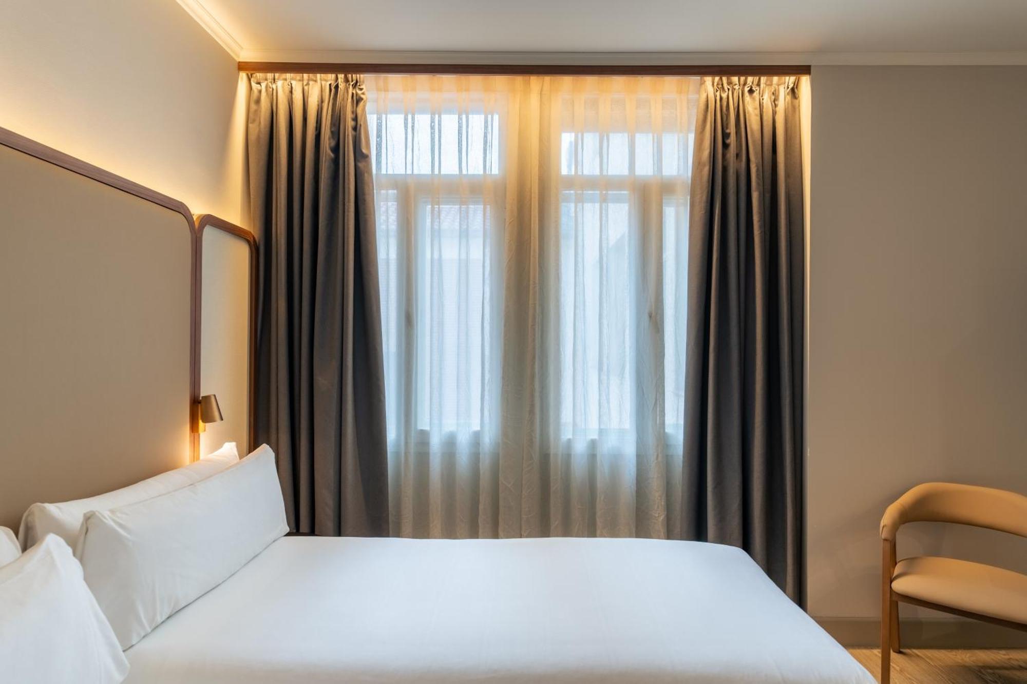 Quarto com Cama de Casal ou 2 de Solteiro (1 a 2 Adultos)